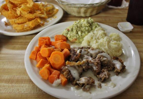 Just another delicious Blue Plate Special:  Chicken Fried Steak, Real Mashed Potatoes, Steamed Carrots, English Pea Salad, and Homemade Roll