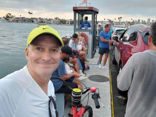 The boy and his bike on the Balboa Ferry to Balboa Island.