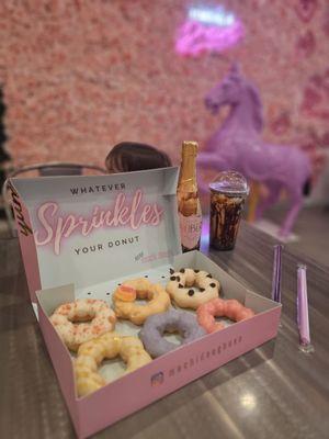 Variety of mochi donuts and milk tea bobba with the cute decoration.