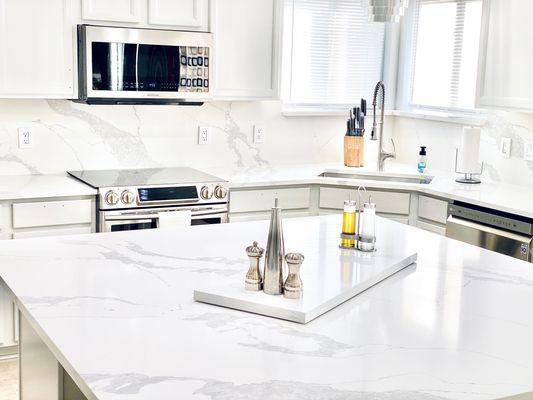 Quartz kitchen countertops with full backsplash