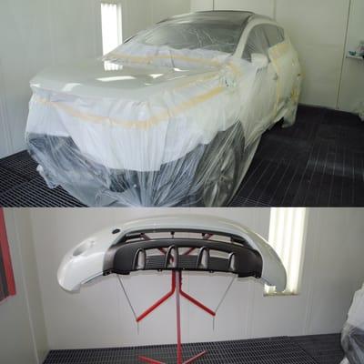 2010 Nissan Murano getting painted in one of our State of the Art downdraft Paintbooth's