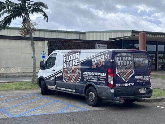 Parking their work truck at the Fort Shafter Exchange while they get lunch inside.