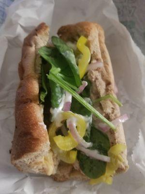 6 inch tuna sub with pepperjack cheese, spinach, purple onion, jalepeno peppers and banana peppers on toasted wheat.