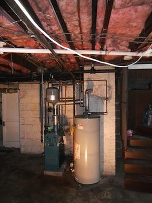 Post abatement and demo of the boiler, this homeowner enjoyed a more spacious basement and peace of mind by having an asbestos free basement