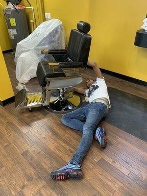 My son putting the finishing touches on the barber chairs. #familyeffort