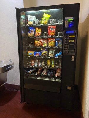 The vending machine was bare looking. On the first floor.