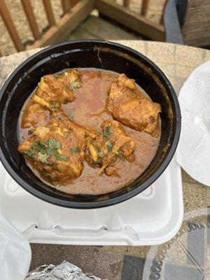 Chicken korma with whole pieces of ginger