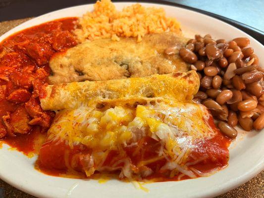 Combination #3: Red Chile Cheese Enchilada, Rolled Beef Taco, Chile Relleno, Beans, Rice, and Chile con Carne