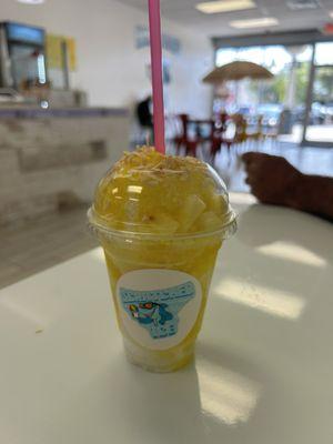 Pina Coloda . Had real pineapple and toasted coconut on top .