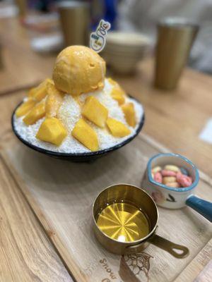 Mango Bingsoo (shaved snow) served with mango syrup and fruit loops