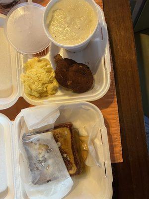 French toast, Salmon cakes, scrambled eggs, and grits