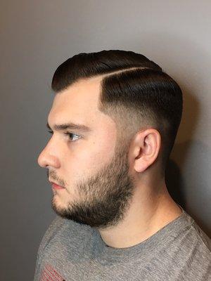 Side part fade * Styled w/ Reuzel Pomade