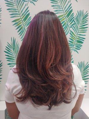 Red highlights and layered cut.