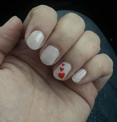 SB manicure with hand painted heart art.