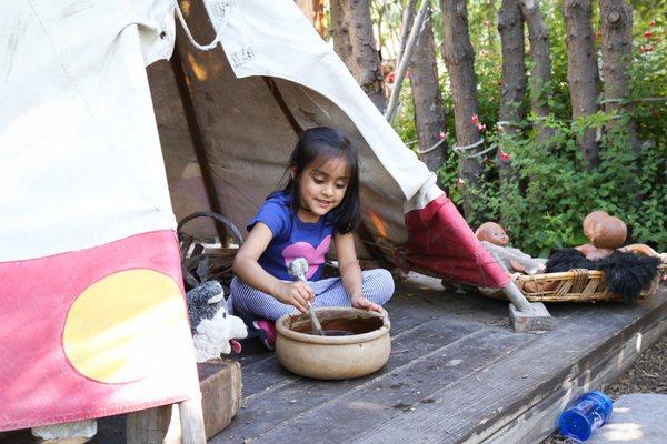 Playing in our Native American Village