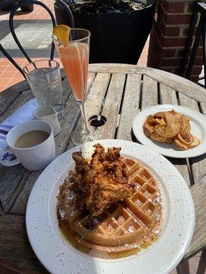 Chicken and waffles Home fries Sunrise mimosa Coffee Water