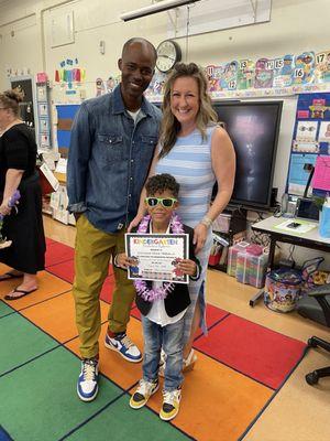 Kindergarten graduation with teacher & Dad