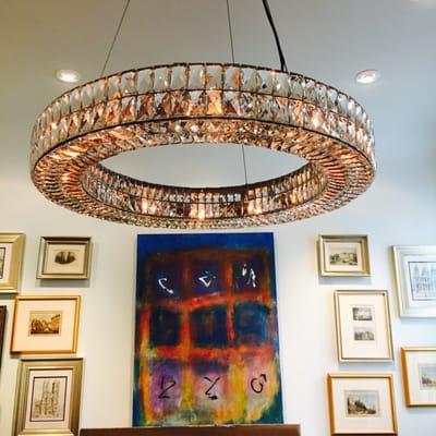 A beautiful (and heavy) crystal chandelier installed by Ike's!