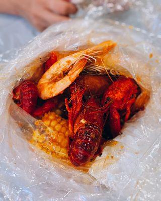 Get Your Feet Wet (1 lb. crawfish, 1 lb. shrimp, dozen andouille sausage, 2 corn, 2 potatoes) / $34