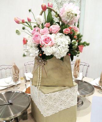 Mixed floral arrangement in a purse