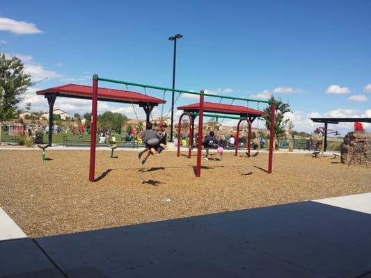 The swings and part of the (huge field).