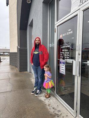 My cousin and baby waiting in the rain for FIVE MINUTES until we were allowed to re enter!