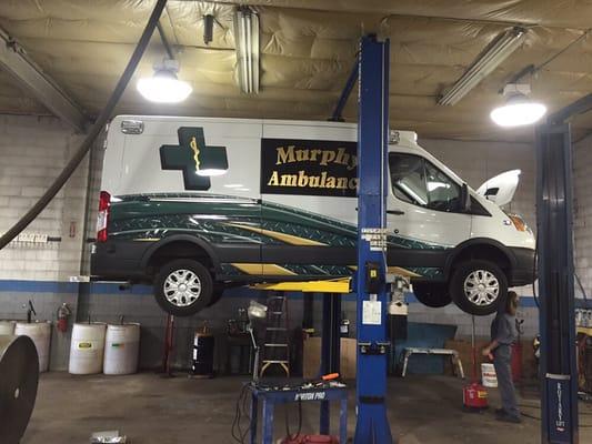 Our light/medium duty truck lift. Handles tall vehicles w/a 18' overhead.