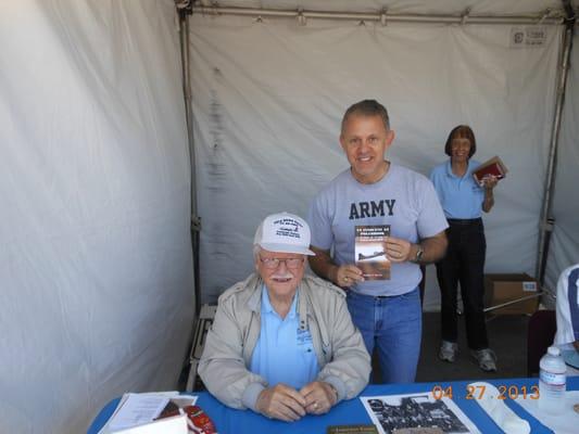 Charles Stevens is an author and B-17 bombardier in WWII. To me, a rock star. He was at 2013 FTF event. His lovely wife in back.