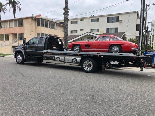 Towing our favorite type of car....a classic.