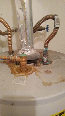 This water heater definitely needs to be replaced. Look up images of one sawed in half on Google search.