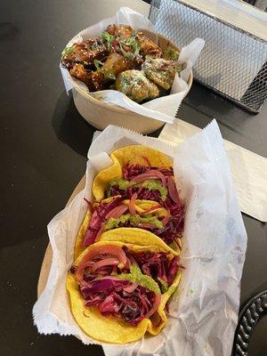 Pork belly tacos and versus wings