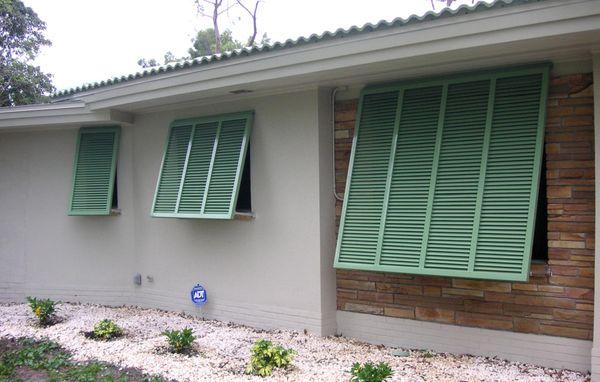 Bahama shutters give your home a tropical look, and come in a variety of colors.