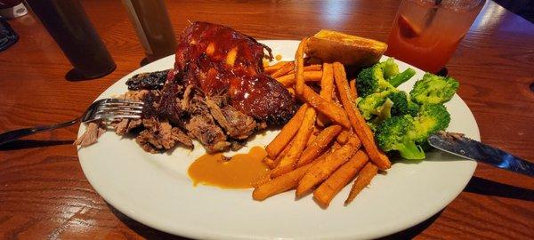 Baby back ribs with Texas beef brisket, sweet potato fries, and broccoli.