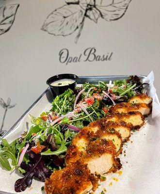 Salad with Hand-breaded Chicken. Choice of 3 house-made dressings.