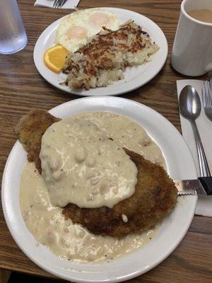 My giant chicken fried steak with eggs & hash browns.