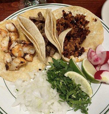 Shrimp, steak, carnitas tacos