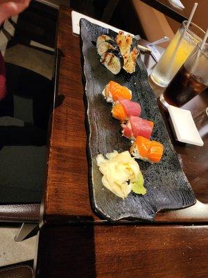 Three musketeers roll on the right side and shrimp tempura roll on the left side