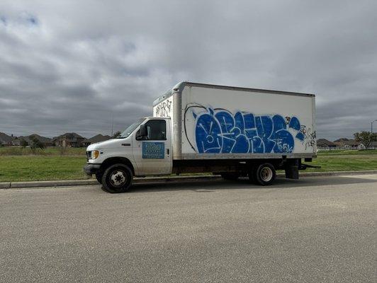 Kitchen Central truck covered in graffiti and profanity bringing down the value of a neighborhood.