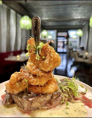 14 ounce New York strip steak with colossal fried shrimp