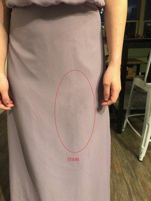 Noticeable Front Stain that occurred during alteration process.