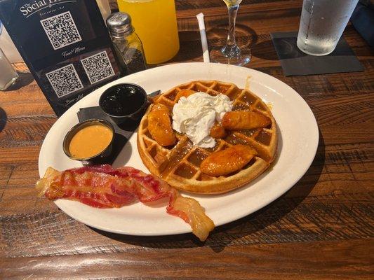 Elvis Waffle and pineapple mango mimosas. Peanut butter added a surprise delight!