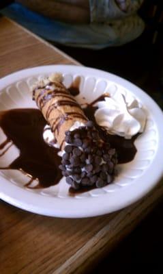 The Chocolate side of the cannoli with real whipped cream and chocolate drizzle - mmmm