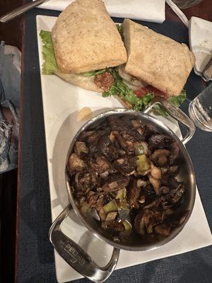 Chicken sandwich and sautéed mushrooms