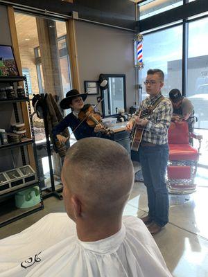 Kids singing in the barbershop