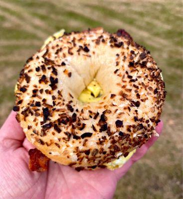 Bacon egg and cheese on an onion bagel