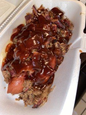 Beef Bacon Dog topped with Brisket.