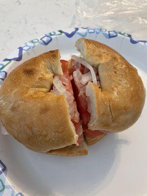 Nova Lox with Cream Cheese, Tomato, and Onion on A Bagel Sandwich