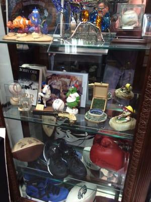 Case with signed Baseballs, Footballs, Boxing gloves, check it out!