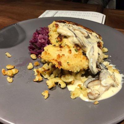 Chicken Schnitzel with white truffle spaetzle, braised red cabbage, jaeger sauce.