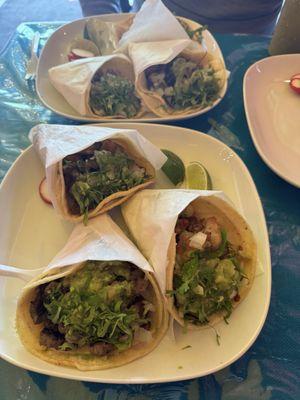 beef, carnitas and al pastor tacos